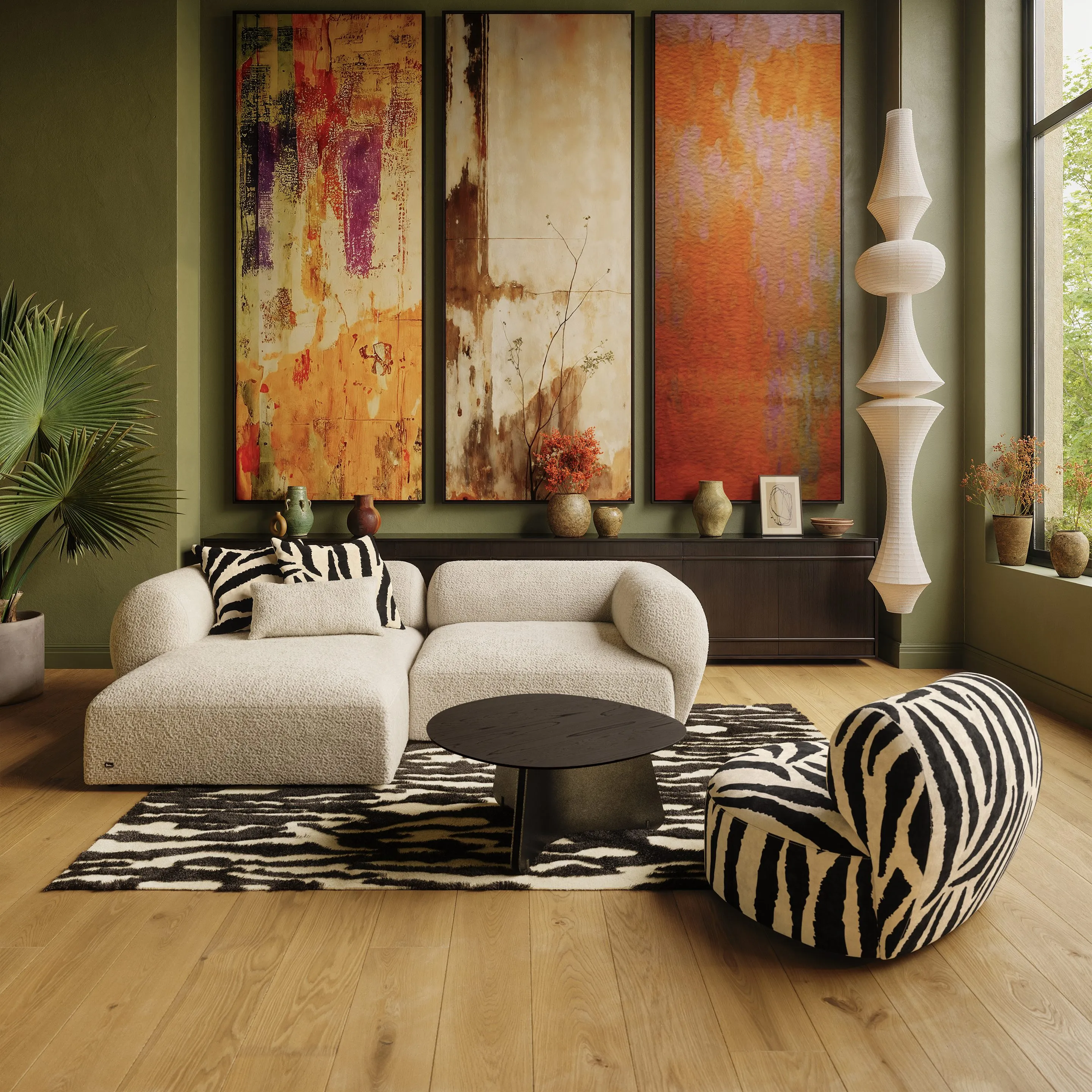 Bretz Tharuun Sofa in Bouclé mit Zebra-Kissen in einem Wohnzimmer