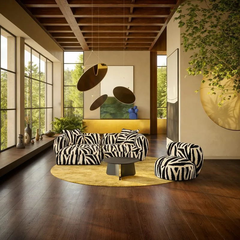 Tharuun Sofas mit Zebra-Bezug in einem hellen Wohnraum